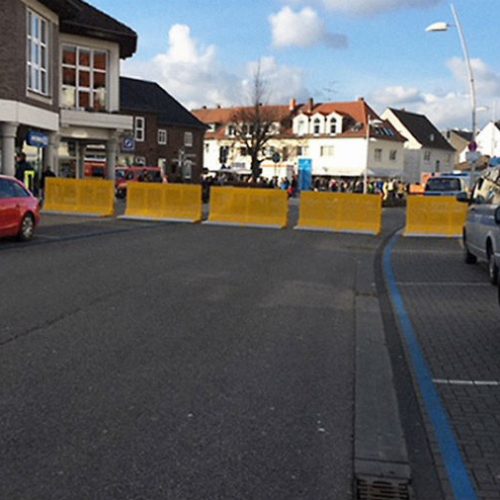 5 units of a vehicle barrier blocking the road
